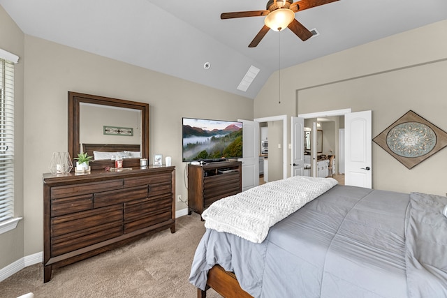 carpeted bedroom featuring lofted ceiling and ceiling fan