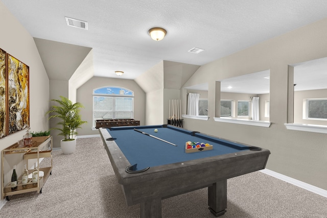 game room featuring pool table, a textured ceiling, carpet flooring, and lofted ceiling