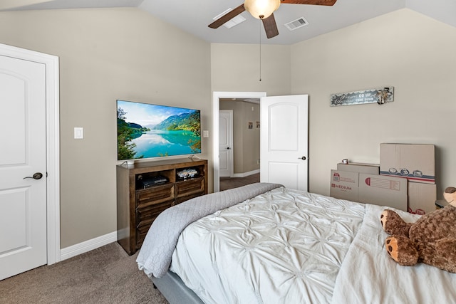 carpeted bedroom with ceiling fan and vaulted ceiling