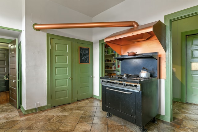 kitchen featuring black gas stove and green cabinets