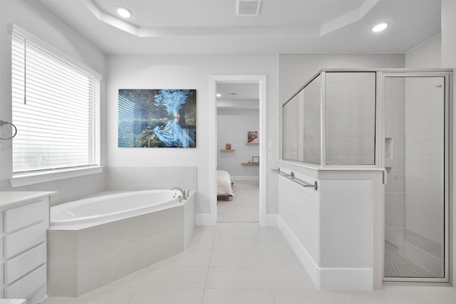 full bath featuring a garden tub, a shower stall, visible vents, and tile patterned floors