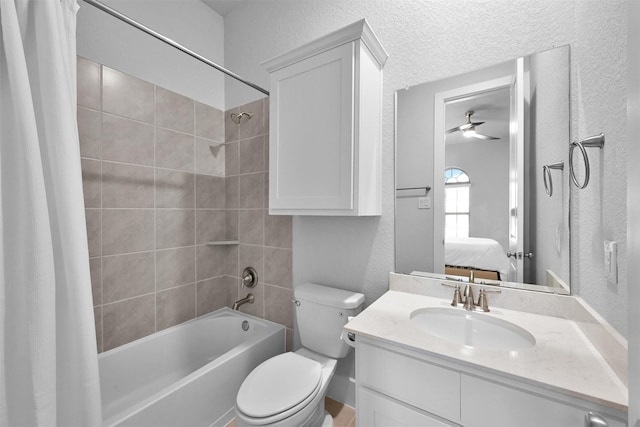 ensuite bathroom with a textured wall, connected bathroom, shower / bathtub combination with curtain, and vanity