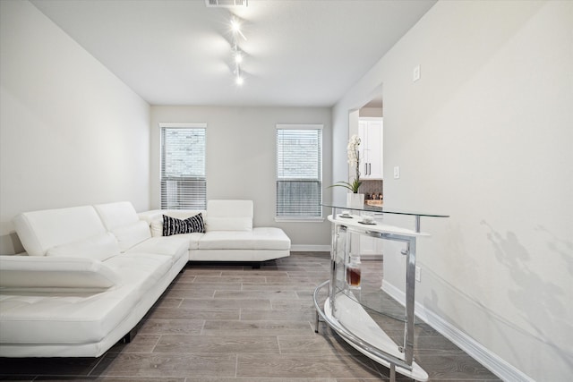 interior space with hardwood / wood-style flooring