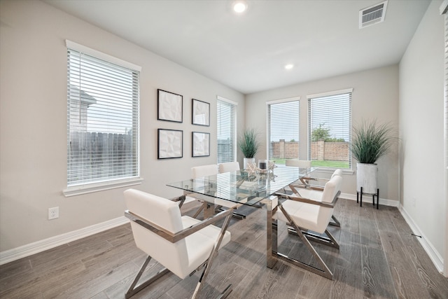 dining area featuring dark hardwood / wood-style flooring