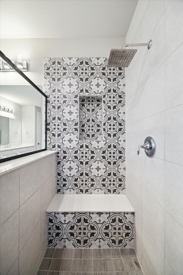 bathroom featuring tiled shower