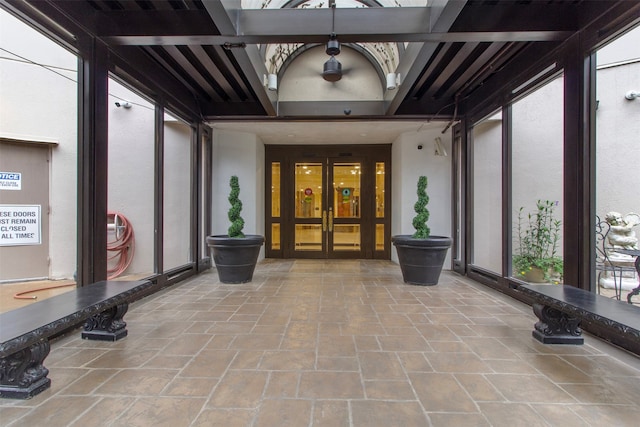 entrance to property with a patio and french doors