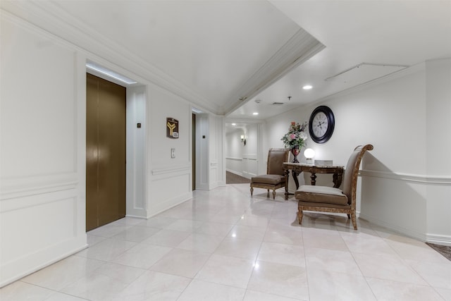 hallway featuring crown molding, light tile patterned floors, and elevator