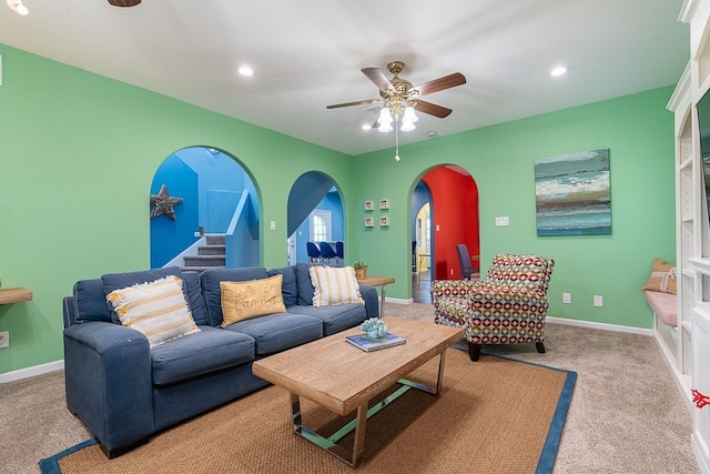 22921 Chiquita St, Galveston, TX 77554 - carpeted living room with arched walkways, recessed lighting, baseboards, and a ceiling fan