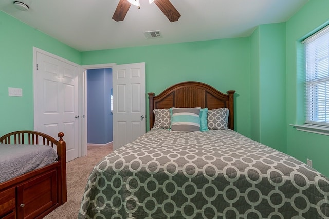 22921 Chiquita St, Galveston, TX 77554 - carpeted bedroom featuring visible vents and a ceiling fan