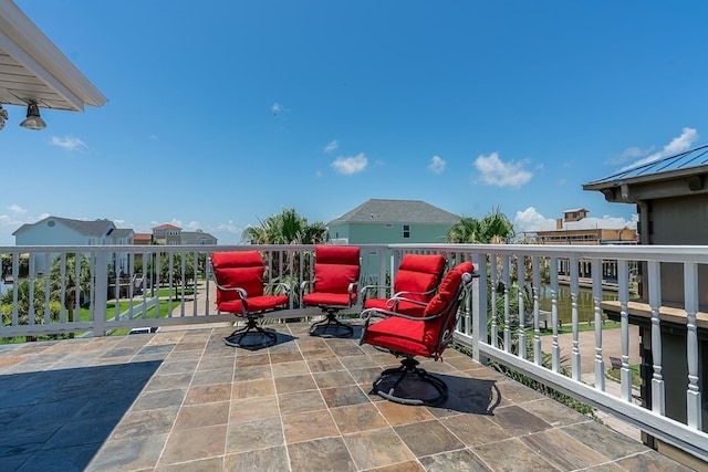 view of patio / terrace with a balcony