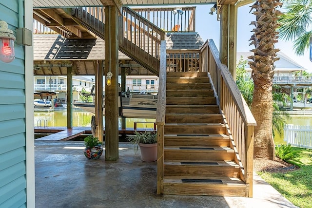 stairs featuring a water view