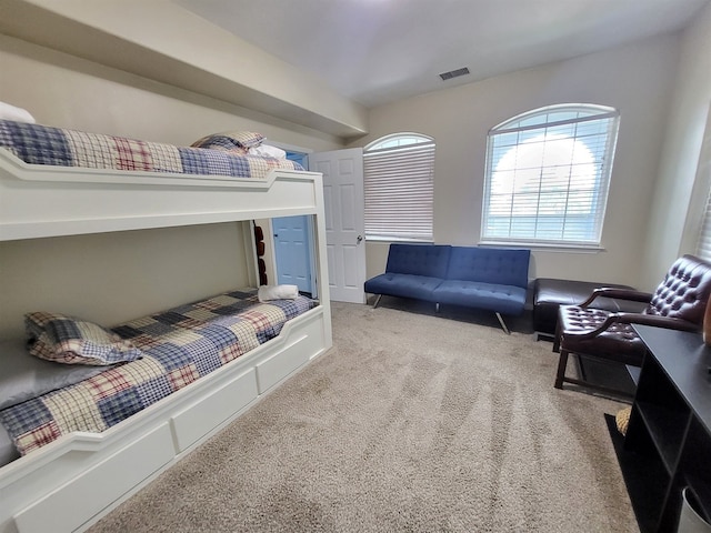 22921 Chiquita St, Galveston, TX 77554 - bedroom with visible vents and light colored carpet