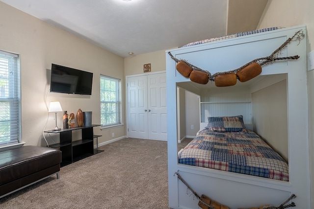 bedroom featuring a closet and carpet