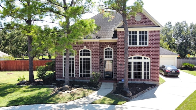 view of front of property with a front lawn