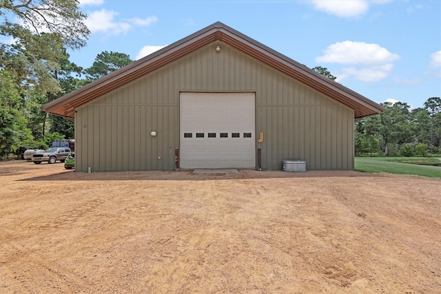 garage with wood walls