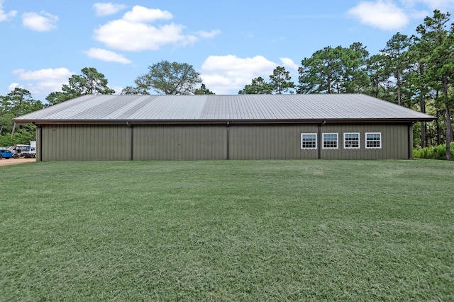 view of outdoor structure featuring a yard