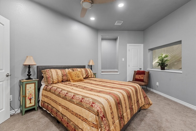 bedroom with ceiling fan and carpet