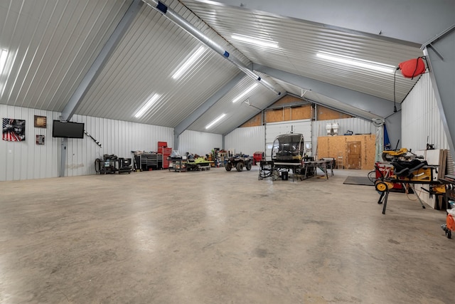 garage with wood walls