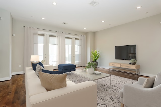 living room with wood-type flooring and french doors