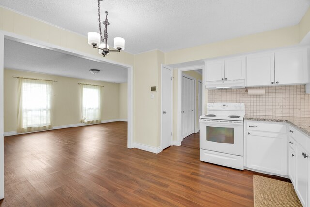 kitchen featuring dark hardwood / wood-style floors, pendant lighting, a chandelier, white cabinetry, and white range with electric stovetop