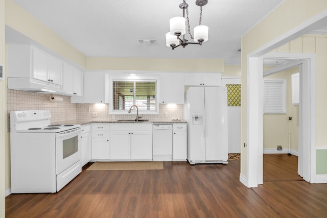 kitchen with an inviting chandelier, white appliances, white cabinetry, sink, and dark wood-type flooring