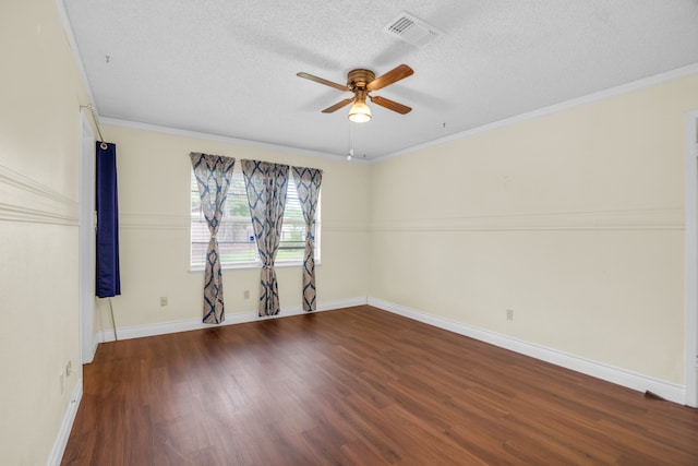 empty room with ornamental molding, a textured ceiling, hardwood / wood-style flooring, and ceiling fan