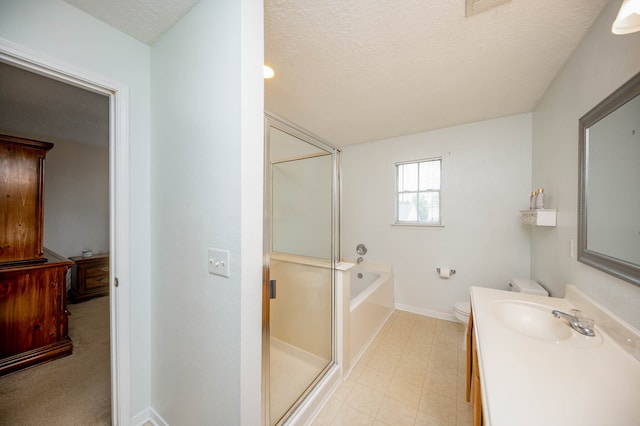 full bathroom with independent shower and bath, toilet, a textured ceiling, and vanity