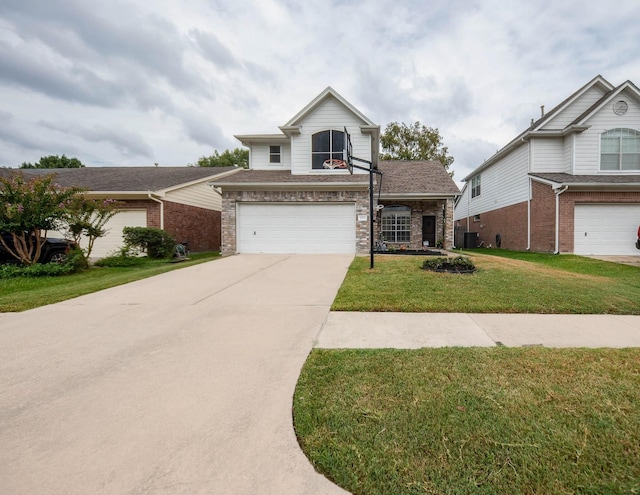 view of front of property featuring a front yard and a garage