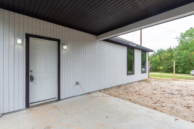 property entrance with a patio