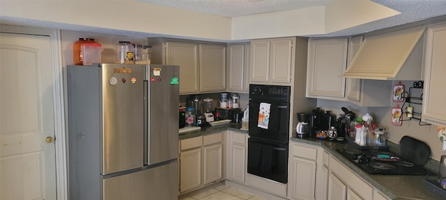 kitchen with a textured ceiling, black appliances, custom exhaust hood, and light tile patterned floors