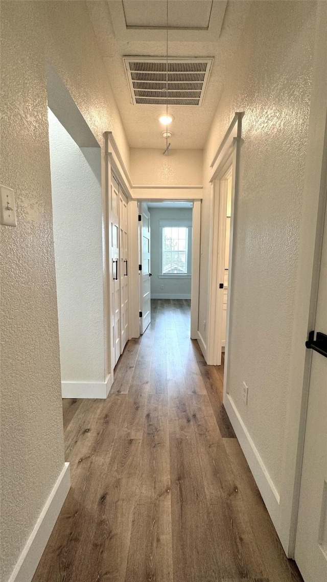 hall featuring wood-type flooring