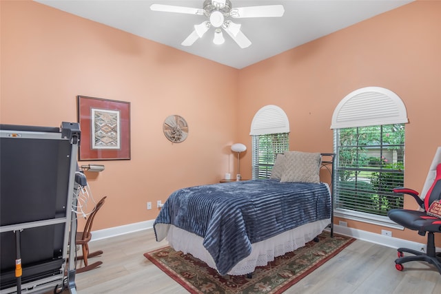 bedroom featuring ceiling fan and light hardwood / wood-style flooring