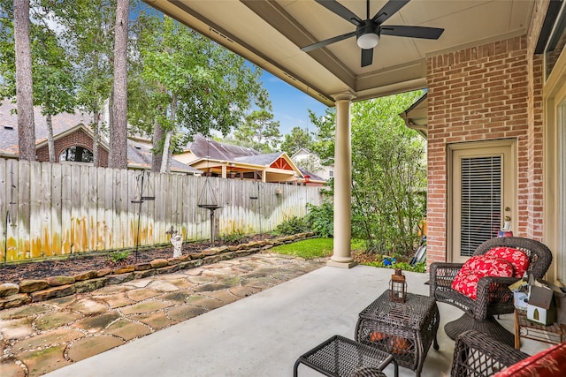 view of patio featuring ceiling fan