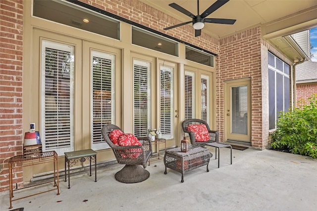 view of patio / terrace featuring ceiling fan