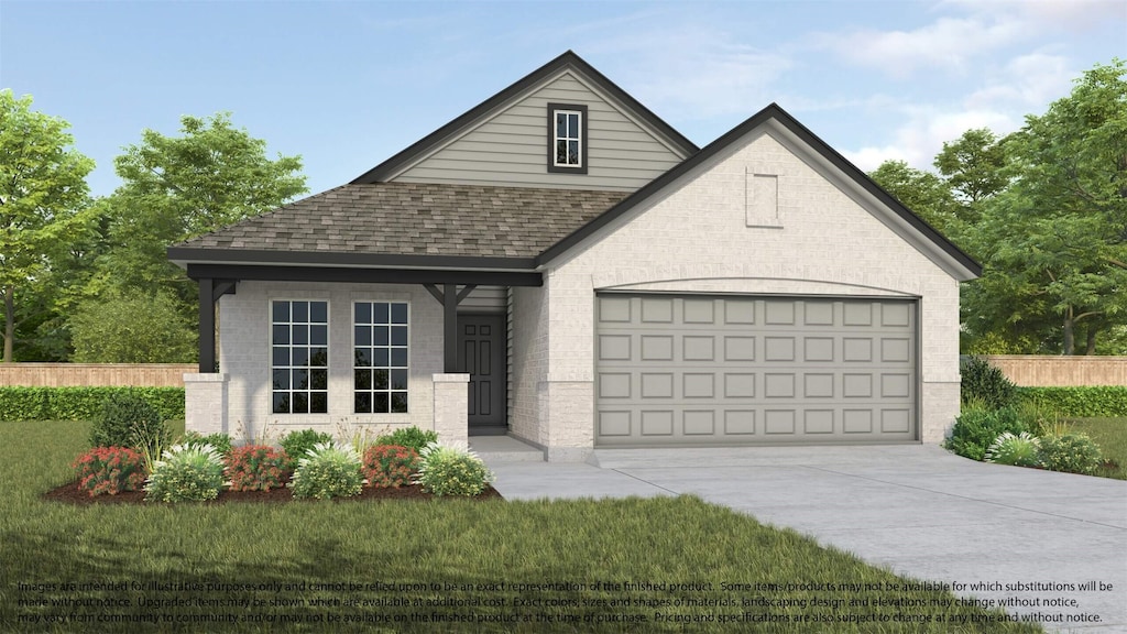 view of front of home featuring a front lawn and a garage