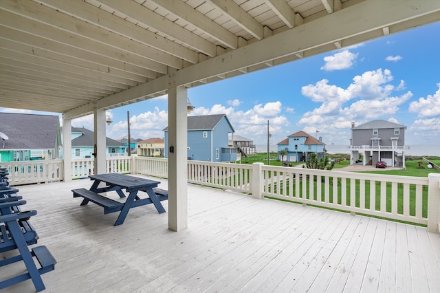 wooden deck with a yard