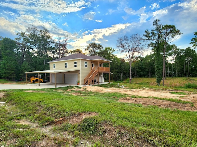 exterior space with a lawn and a garage