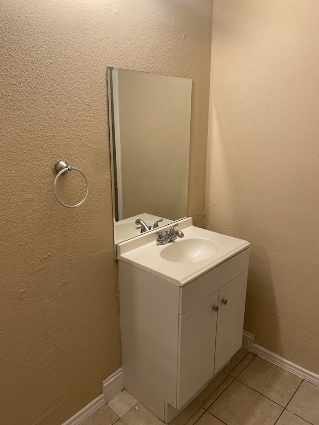 bathroom featuring vanity and tile patterned flooring