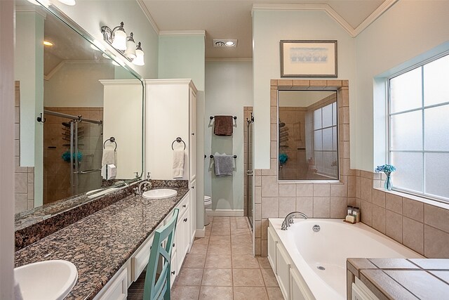 full bathroom with vanity, tile patterned flooring, crown molding, toilet, and plus walk in shower