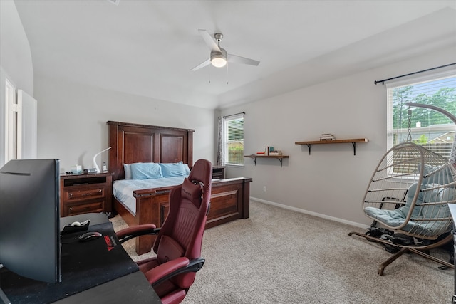 bedroom featuring ceiling fan and light carpet