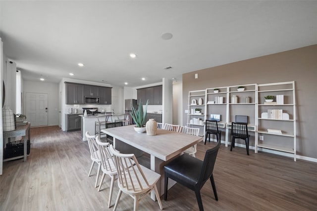 dining room featuring hardwood / wood-style floors