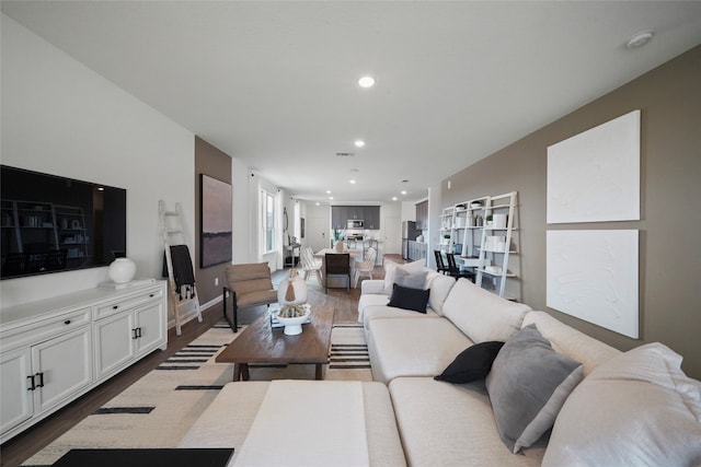 living room with hardwood / wood-style floors