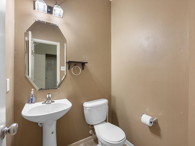 bathroom featuring toilet