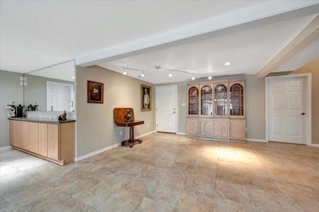 2601 Christopher Sq, Galveston, TX 77551 - living room featuring baseboards