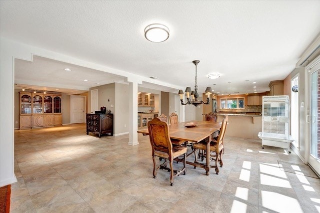 dining room featuring a chandelier