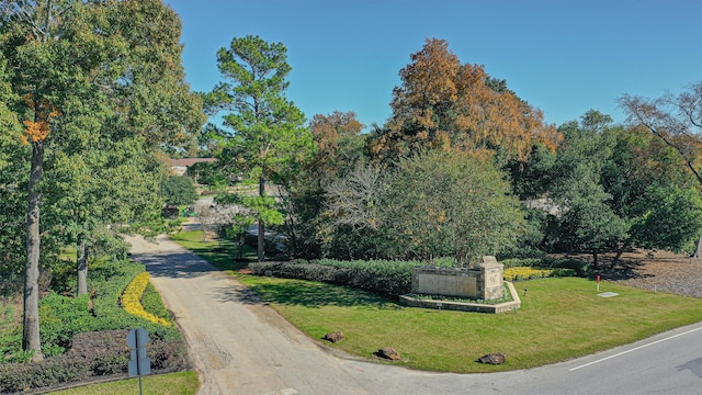 surrounding community featuring a lawn