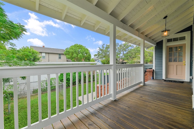 deck featuring a yard