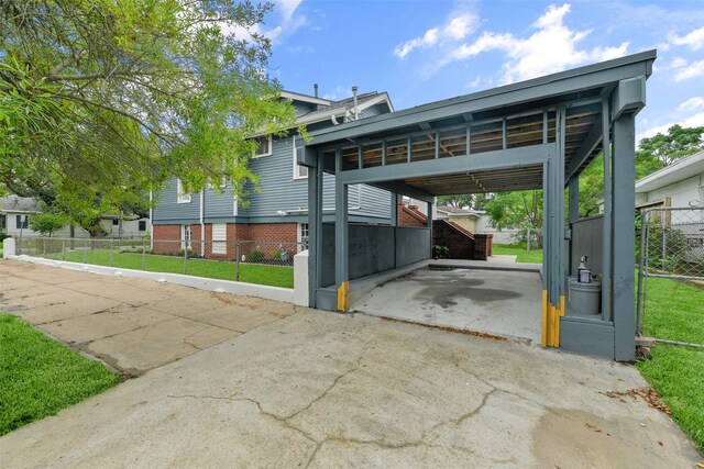 view of parking featuring a yard