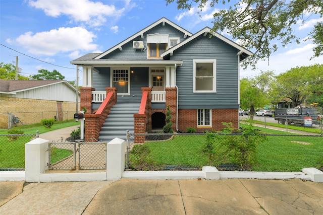 view of front facade featuring a porch and a front lawn