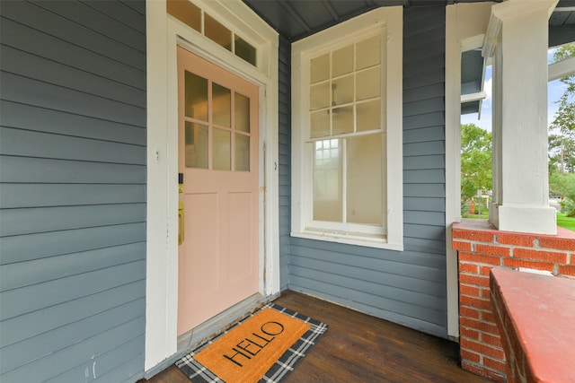 doorway to property with a porch